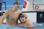 epaselect epa11504345 Nicolo Martinenghi of Italy celebrates winning the Men 100m Breaststroke final of the Swimming competitions in the Paris 2024 Olympic Games, at the Paris La Defense Arena in Paris, France, 28 July 2024. EPA/FRANCK ROBICHON