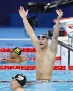 epa11504385 Nicolo Martinenghi of Italy celebrates winning the Men 100m Breaststroke final of the Swimming competitions in the Paris 2024 Olympic Games, at the Paris La Defense Arena in Paris, France, 28 July 2024. EPA/FRANCK ROBICHON