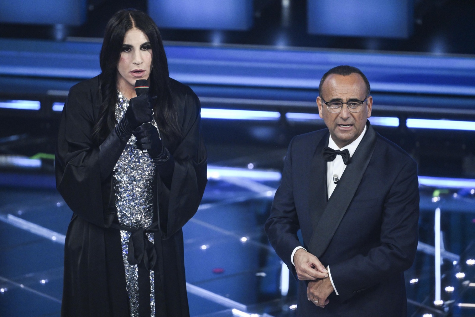 Sanremo Festival host and artistic director Carlo Conti (R) and Italian actor Vincenzo De Lucia (L) on stage at the Ariston theatre during the 76th edition of the Sanremo Italian Song Festival, in Sanremo, Italy, 24 February 2026. The music festival will 