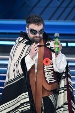 Italian singer Dargen D'Amico performs on stage at the Ariston theatre during the 76th edition of the Sanremo Italian Song Festival, in Sanremo, Italy, 25 February 2026. The music festival will run from 24 to 28 February 2026. ANSA/RICCARDO ANTIMIANI