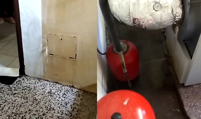 L’acqua che fuoriesce da una cassetta di ispezione su un pianerottolo e l’allagamento nella zona della caldaia