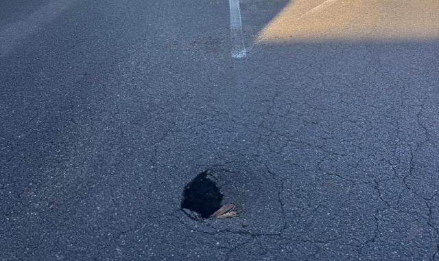 Voragine sulla strada: pericolo a Malgesso